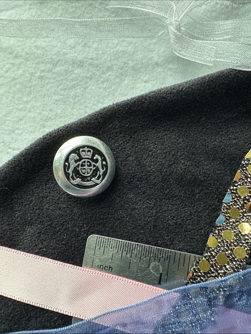 Crest Button Accent in Silver and Black